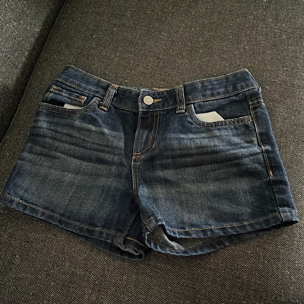 Dark blue kids jeans shorts.